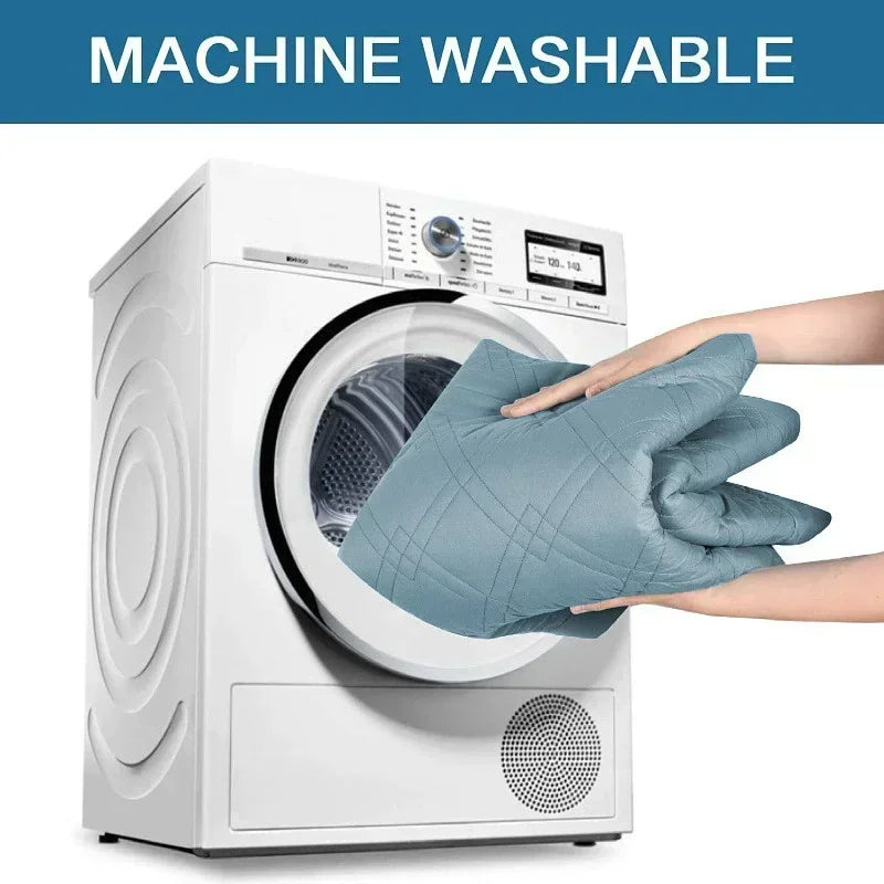 White washing machine with a person holding a blue glove above it, labeled 'Machine Washable'.